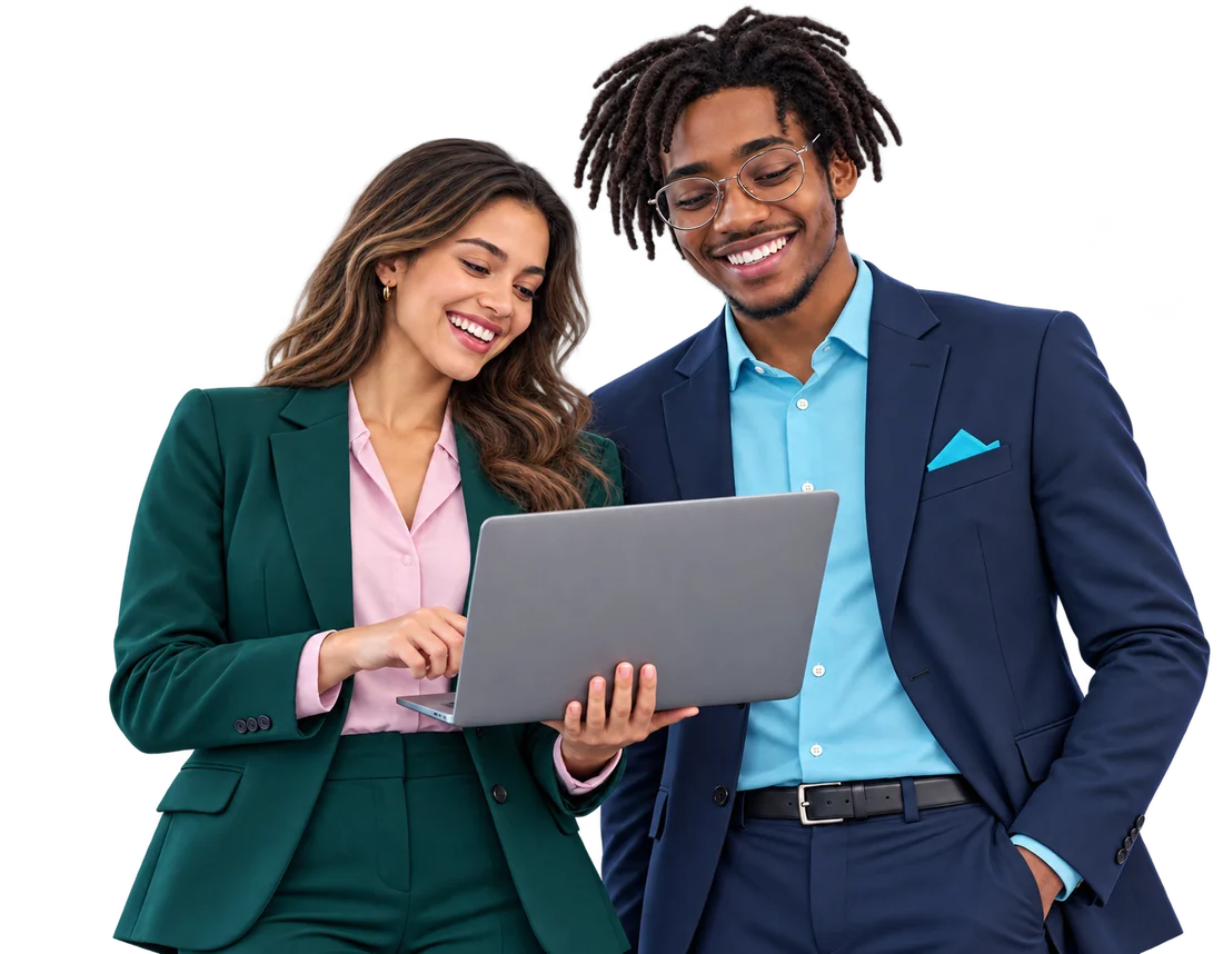 Two colleagues smiling as they look at a laptop together